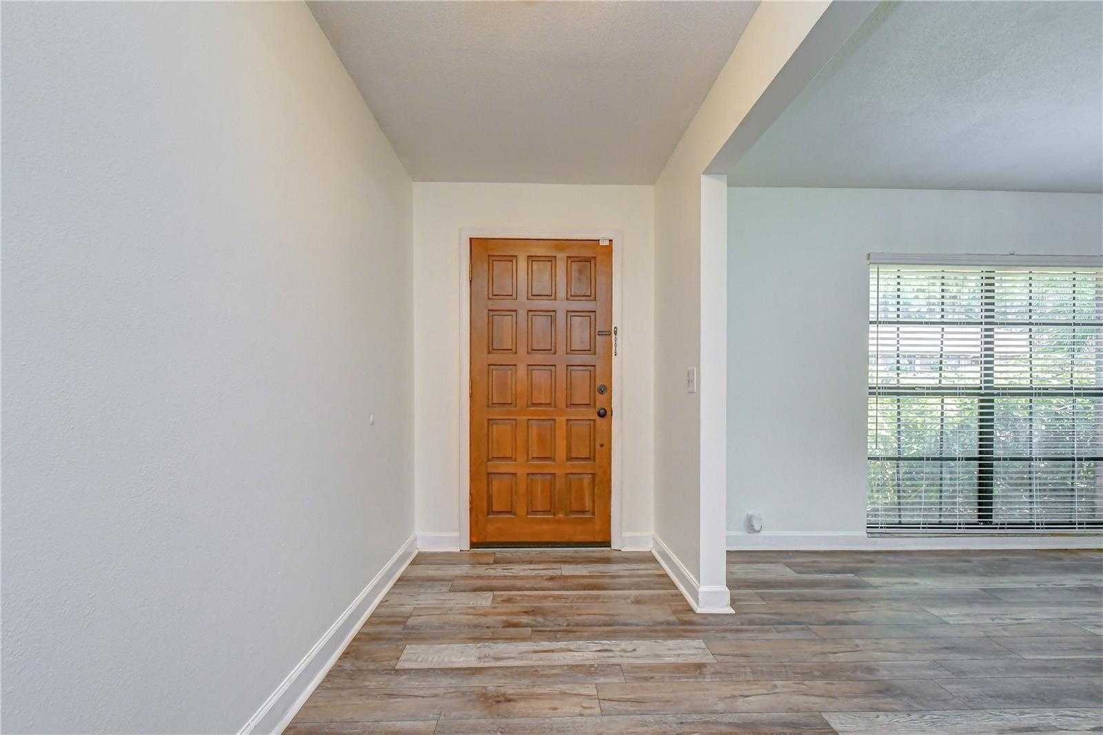 Bright entryway introducing the home's spacious and inviting layout