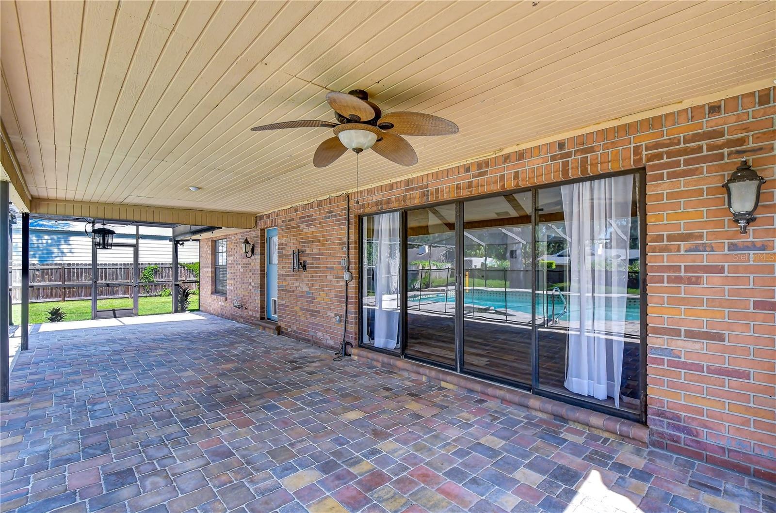 Shaded area ideal for relaxing, dining, and entertaining