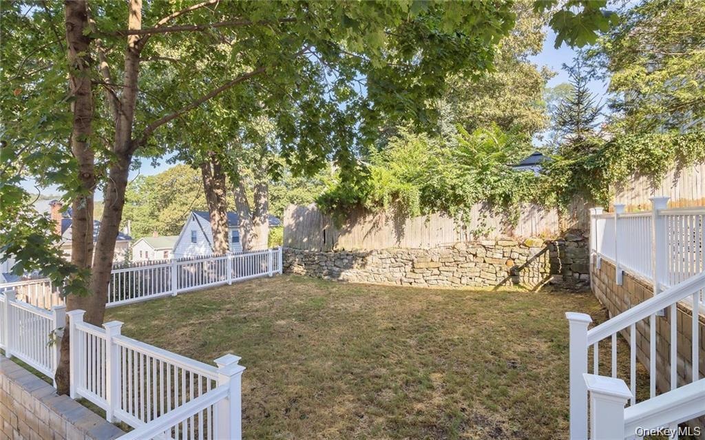 View of fenced backyard