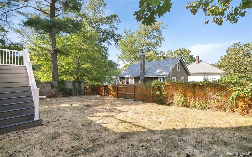 View of fenced backyard