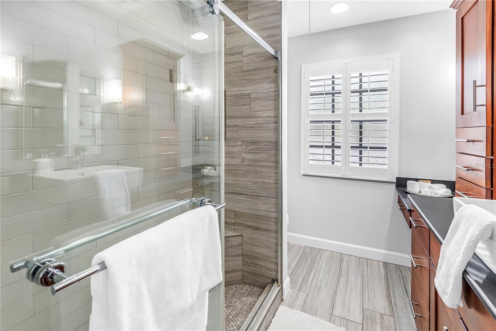 Stainless Hardware Glass Doors and Private Toilet area.