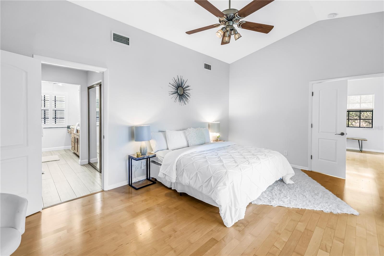 Upstairs Primary Bedroom is private and spacious with en suite luxury bath