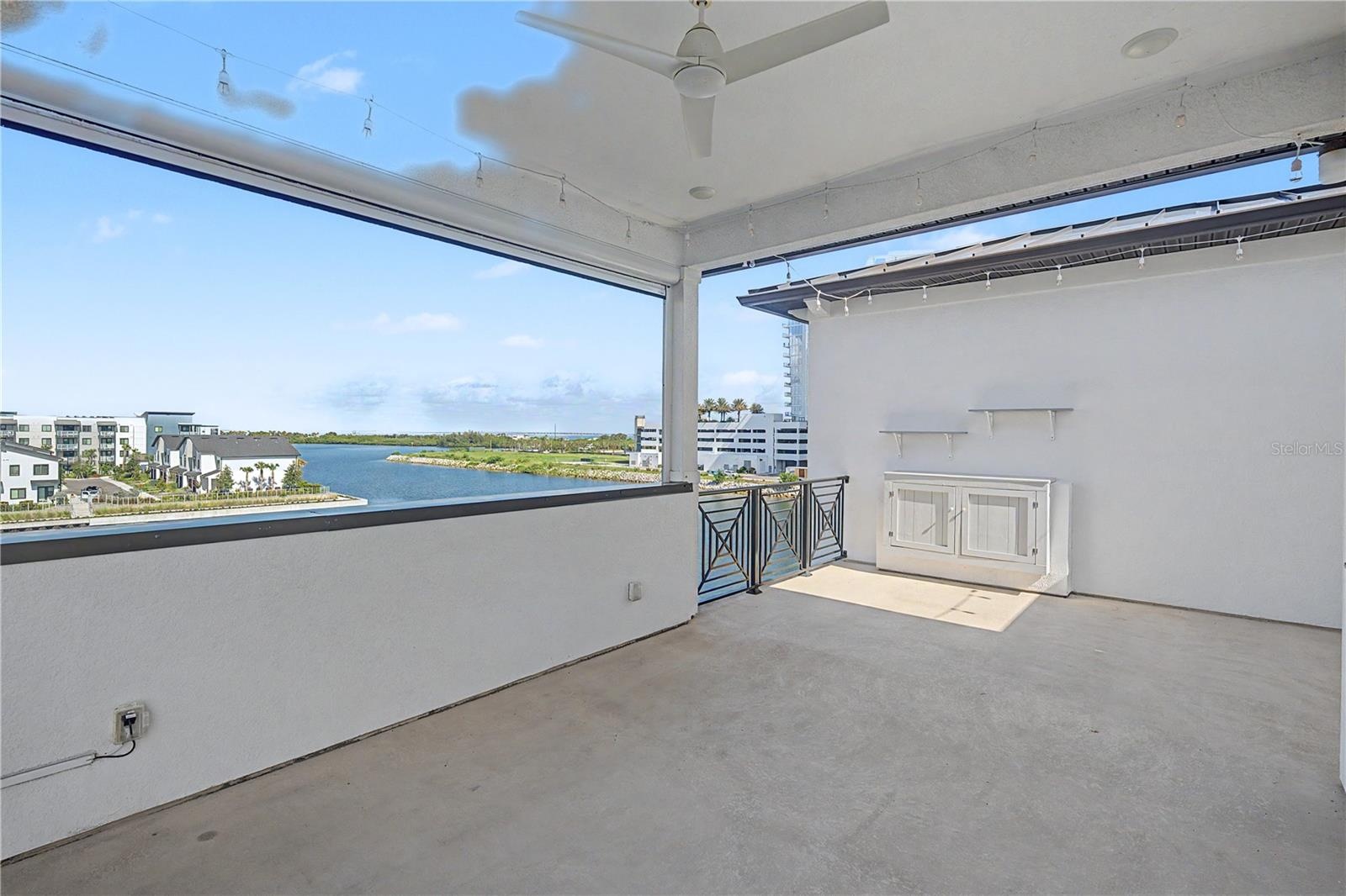 Fourth-level private patio offering a front-row seat for possible dolphin sightings.
