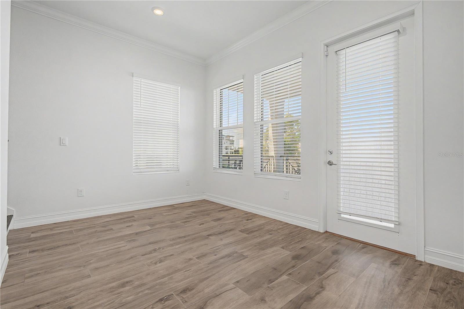 First-level living area with direct access to the outdoor patio and beautiful waterfront views.