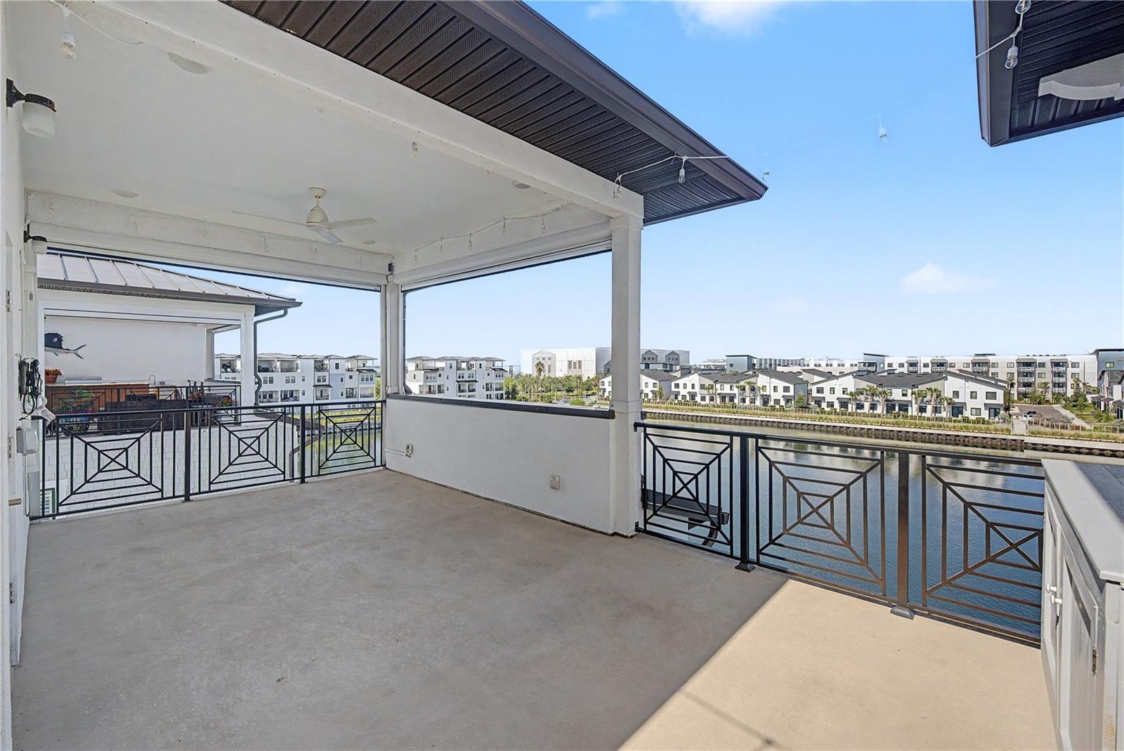 Fourth-level outdoor seating area with more beautiful water views.
