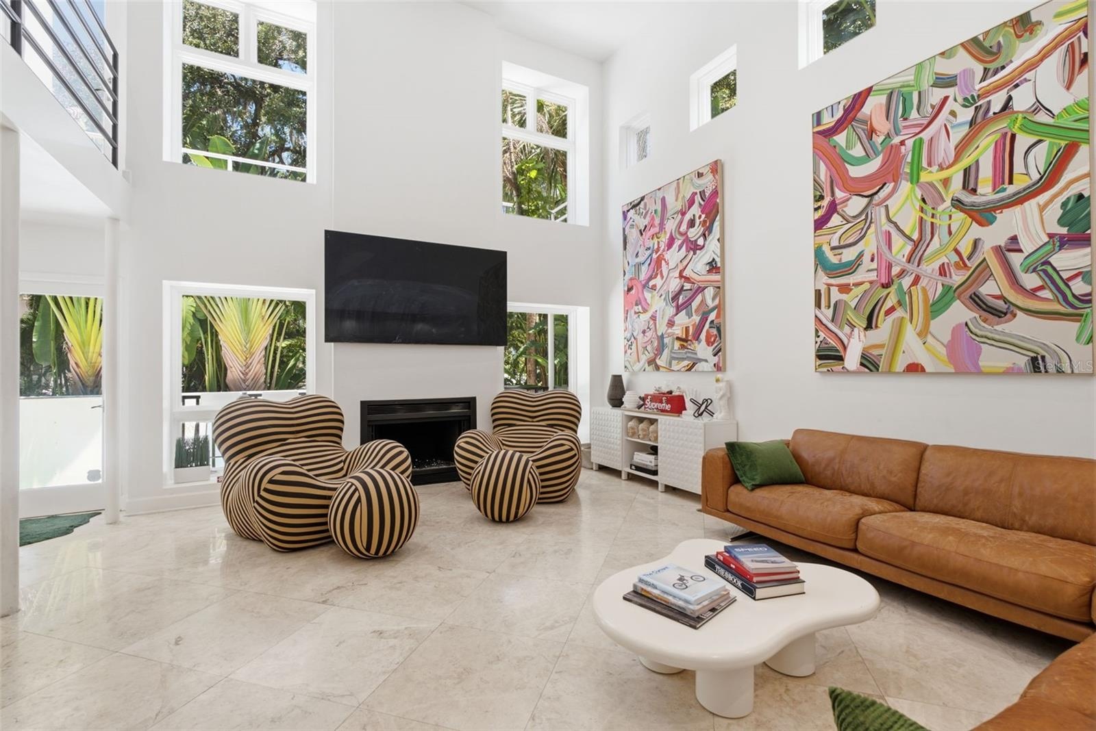 Living area leads to rear porch and pool