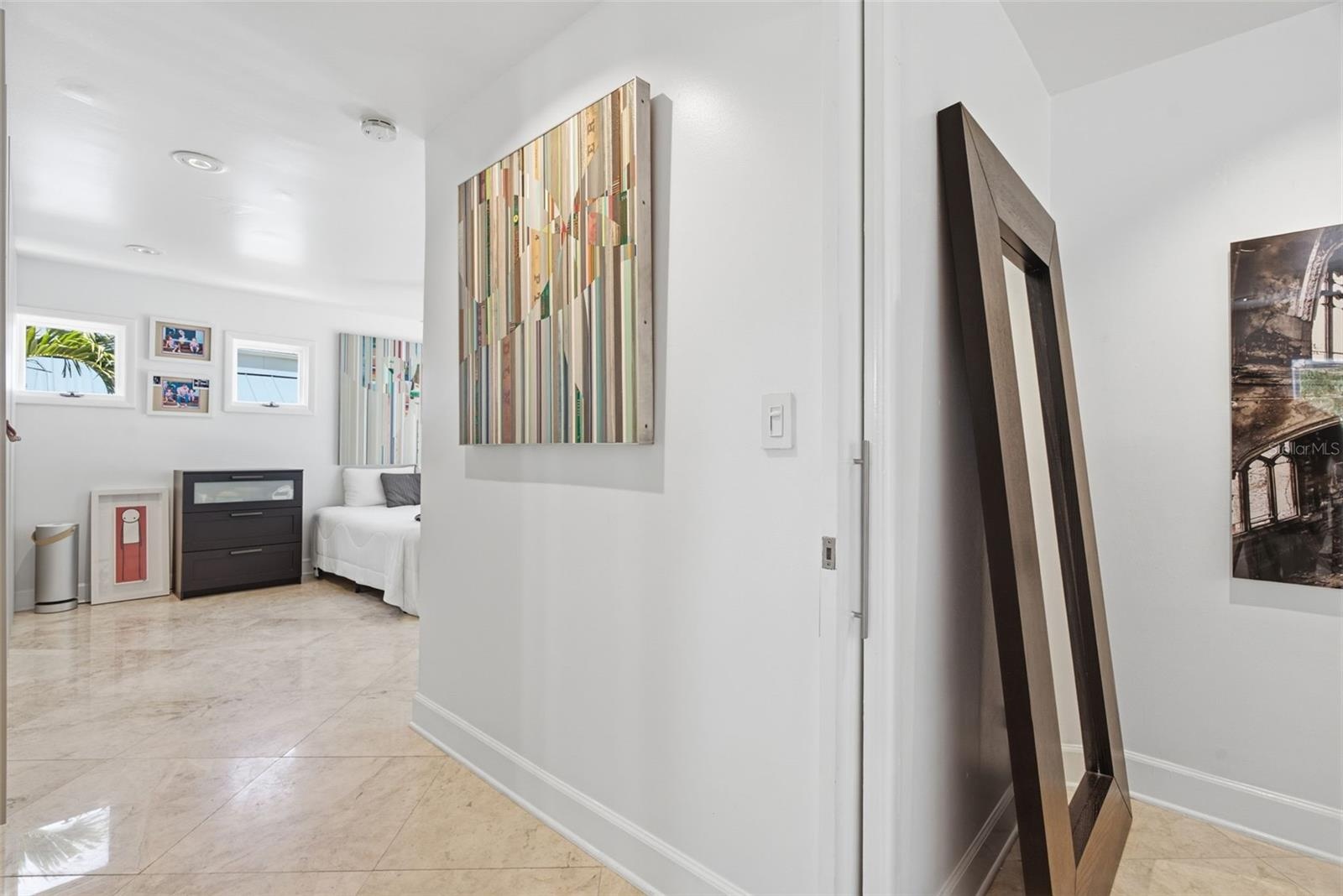 Entry from landing to primary suite