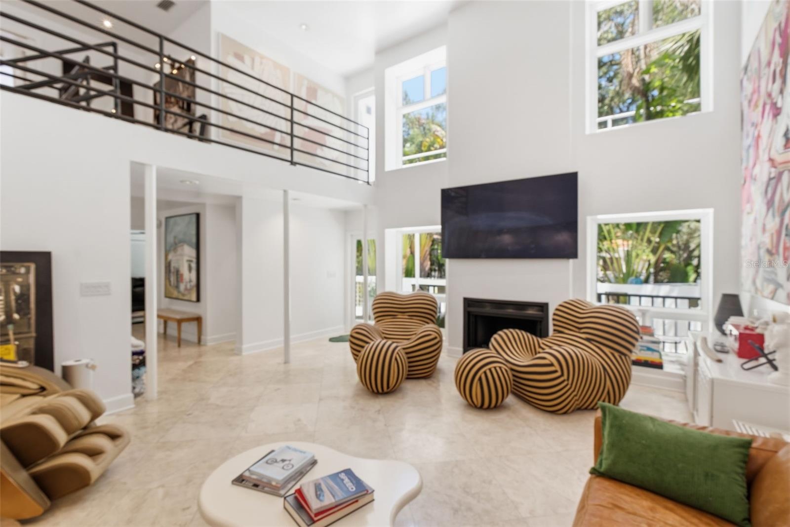 Two story 24'ceiling space with fireplace