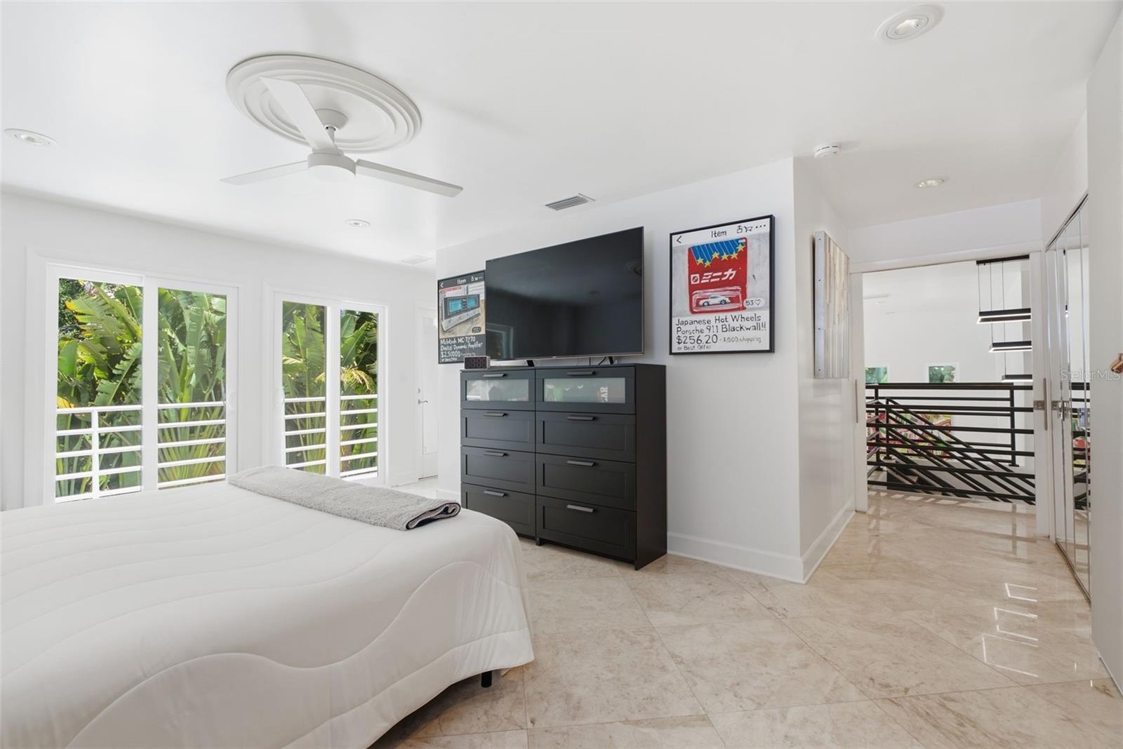 French doors lead to private balcony
