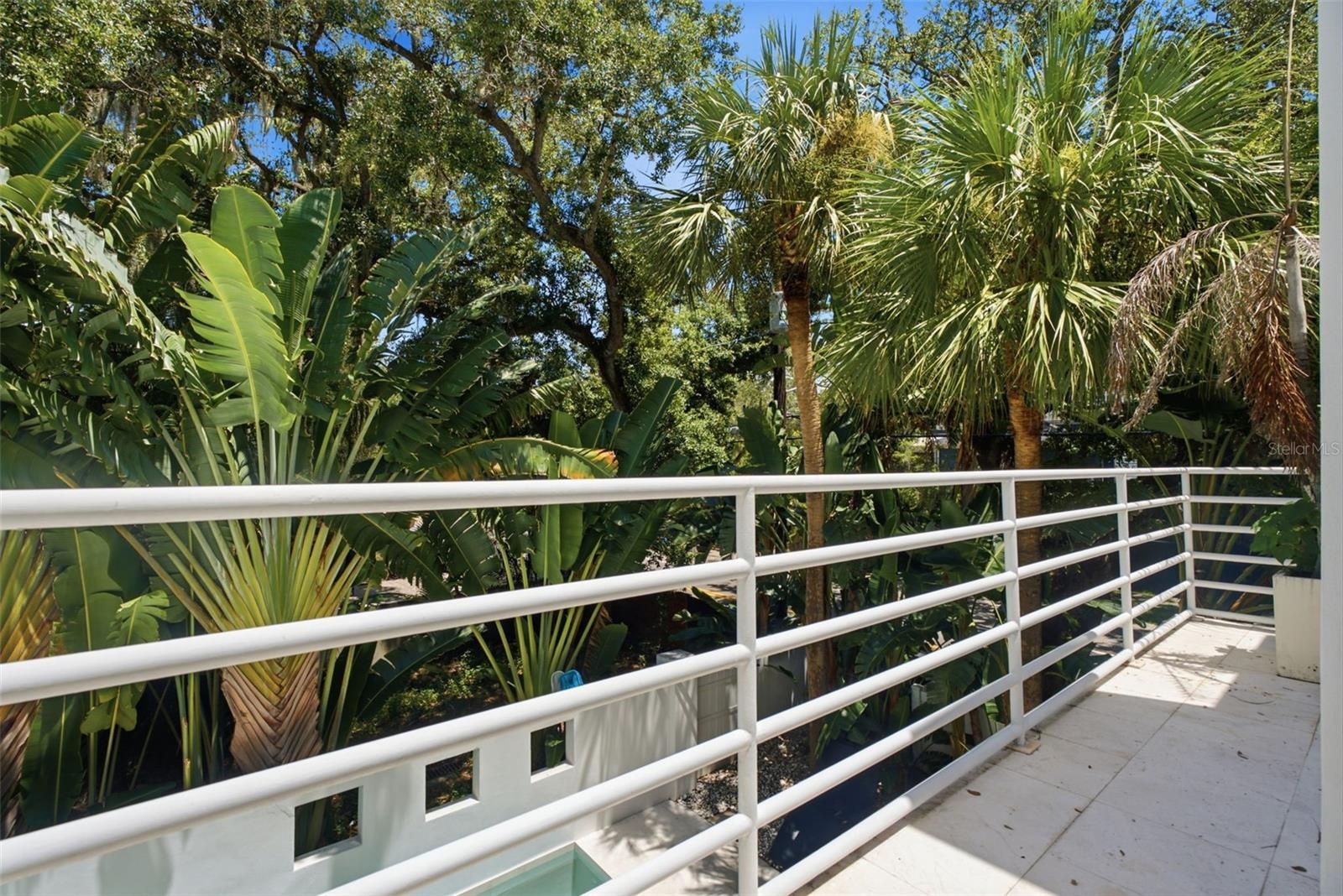 2nd level balcony overlooking pool