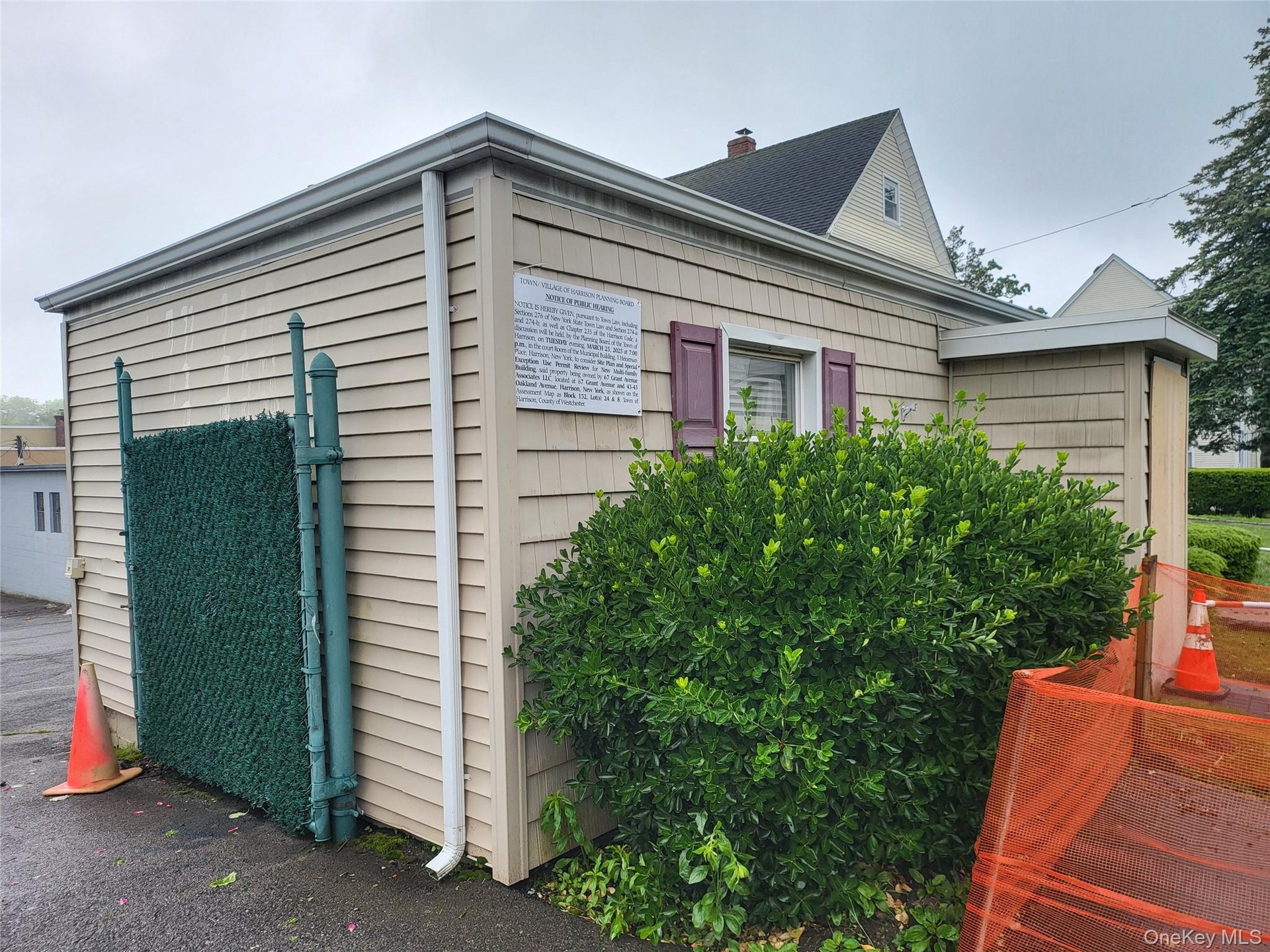 View of side of property featuring a chimney