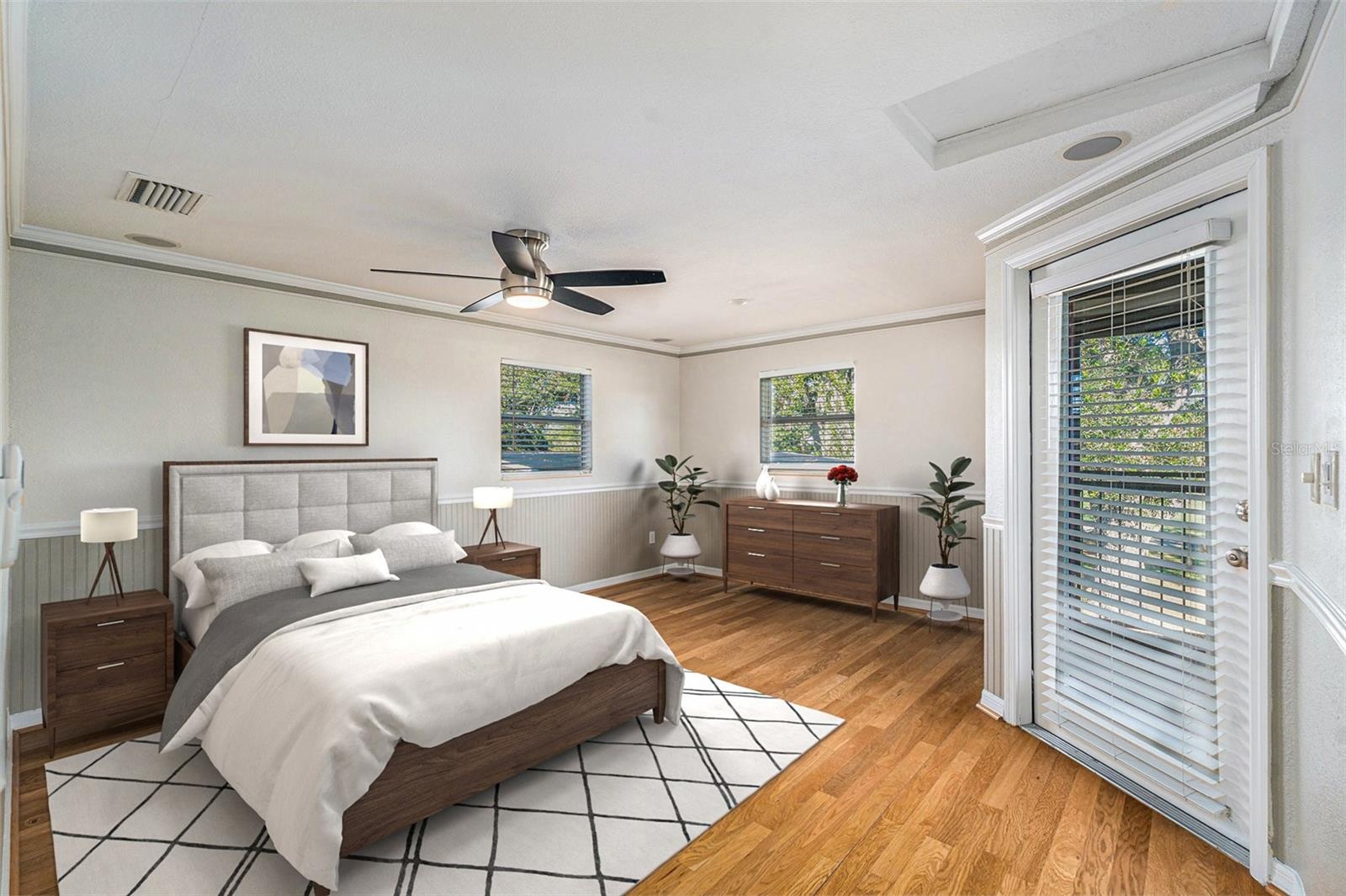 Primary Bedroom with screened balcony