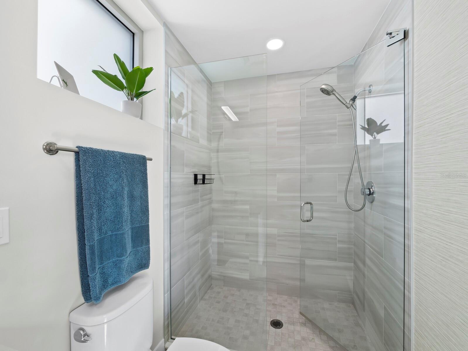 Tile floors in both bathrooms