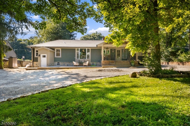 Rear of home w/ porch