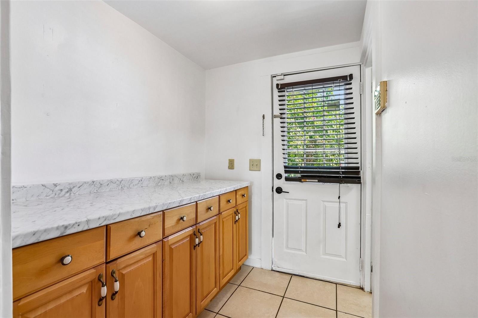 Door leads to back patio.