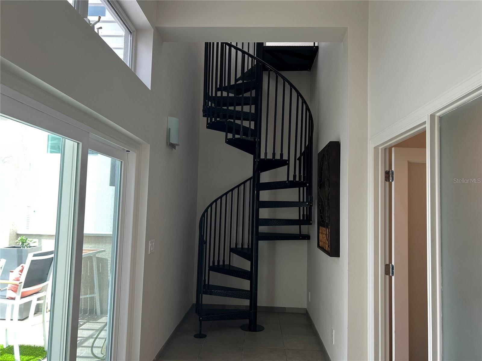 hallway to 2nd floor 3rd guest bedroom and main floor