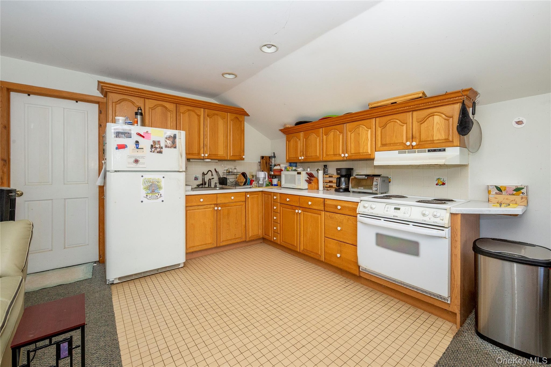 Open layout between the living, dining and kitchen.