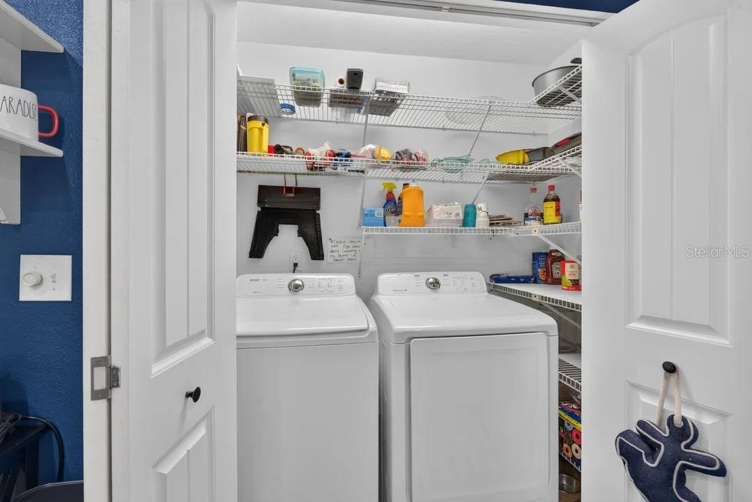 Laundry closet in the kitchen area