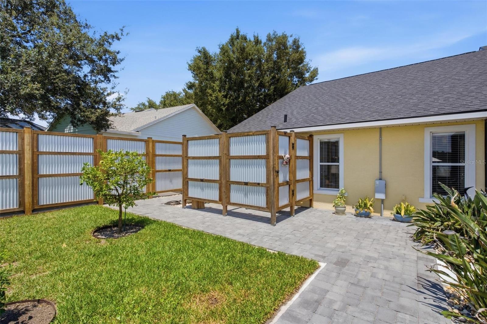 Outside shower and boat trailer enclosure