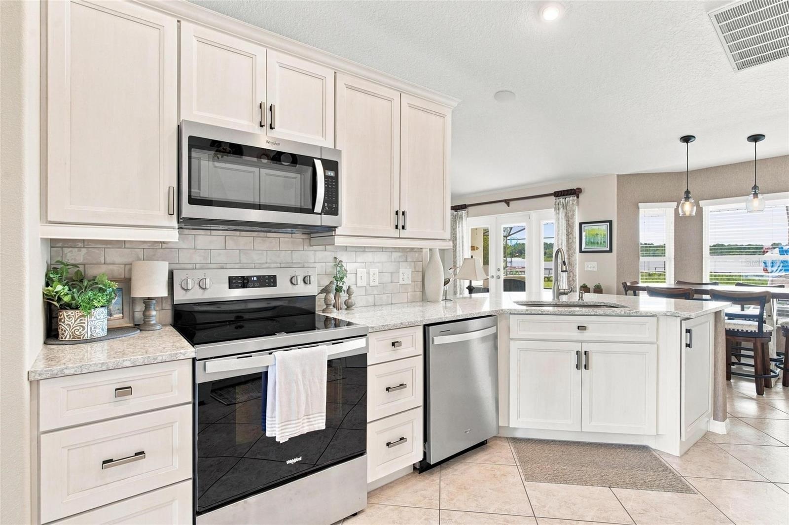 New cabinets, tops and appliances