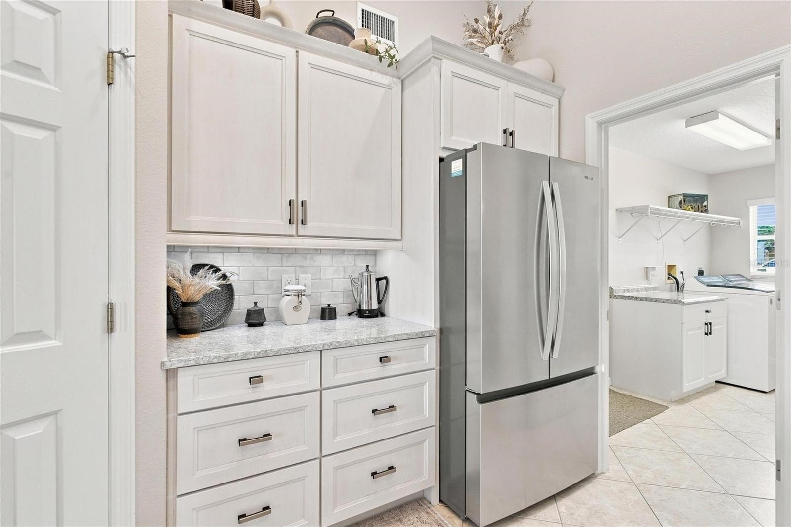 New cabinets, tops and appliances