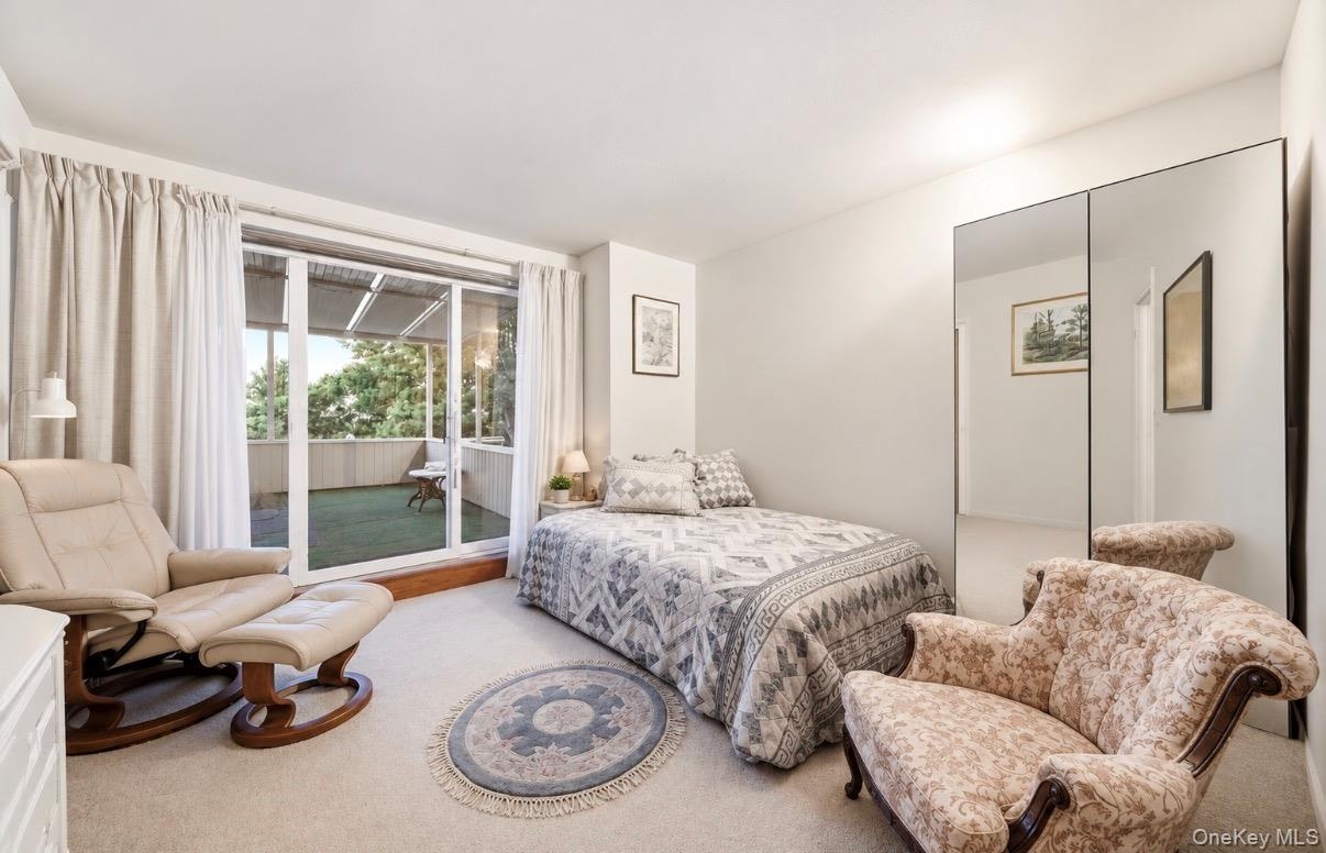 Bedroom w/ balcony access