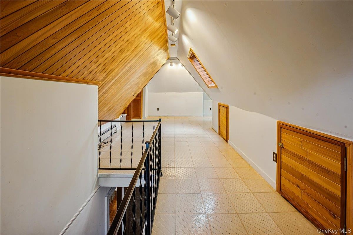 Third floor bedroom with skylight