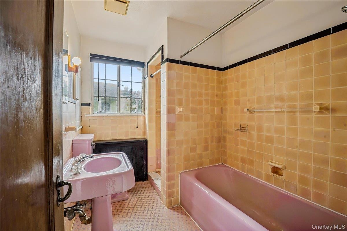 Secod floor four fixture bathroom