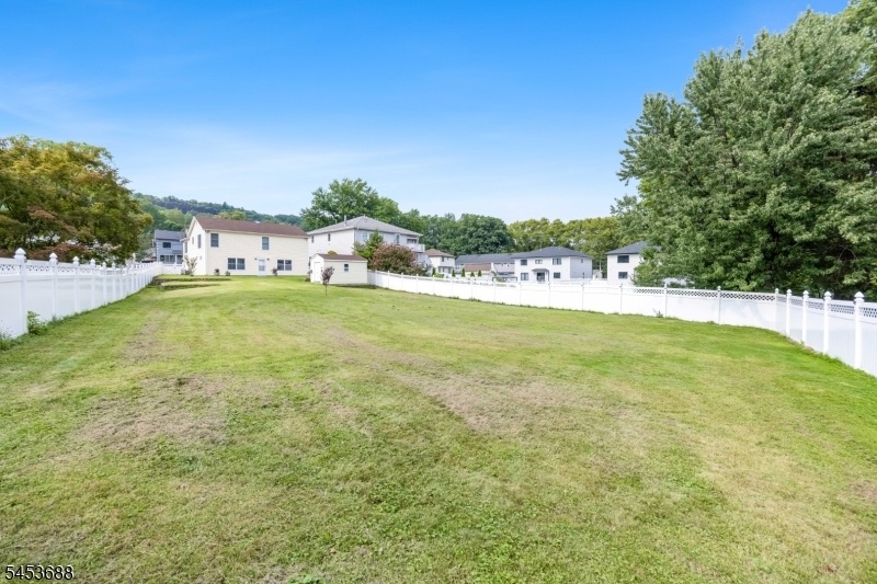 Flat, grassy backyard