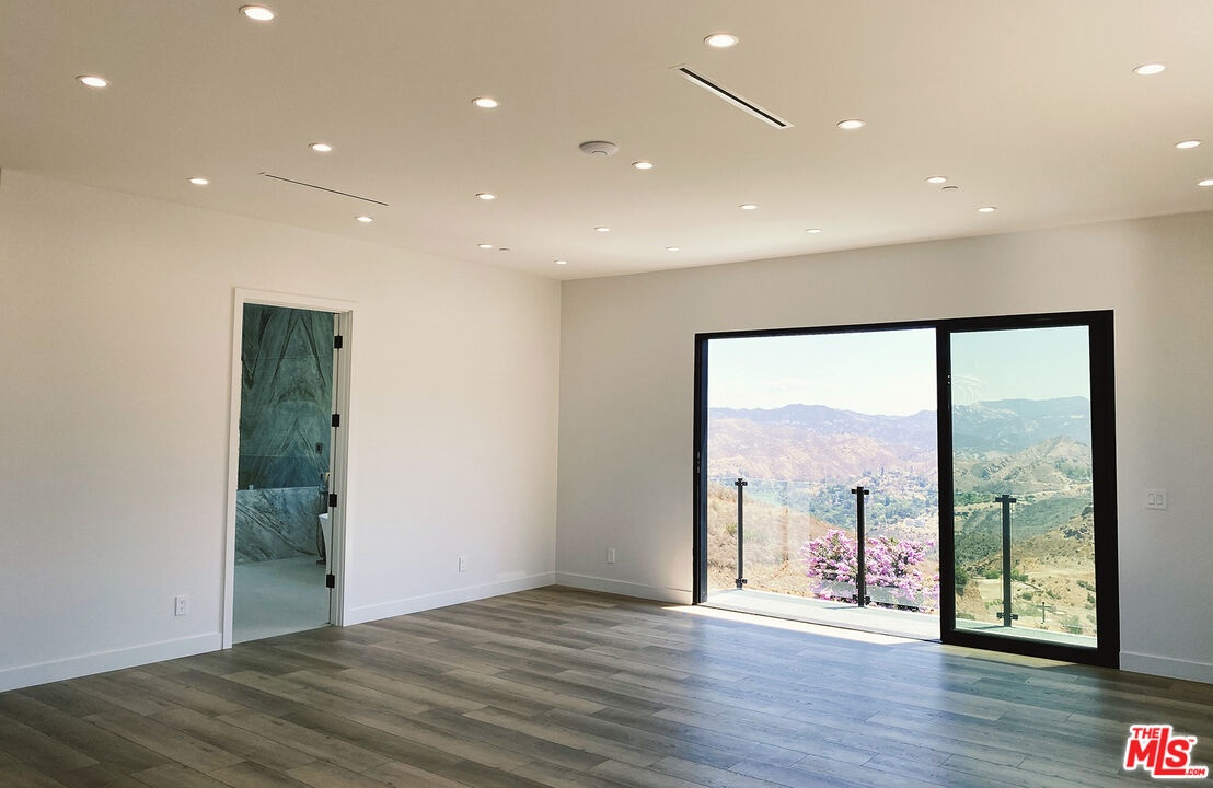 giant primary bedroom suite