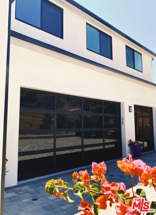 3 car private glass door garag