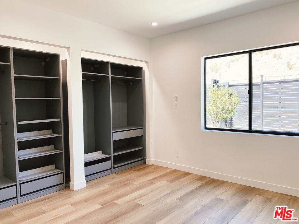 guest bedroom downstairs, has