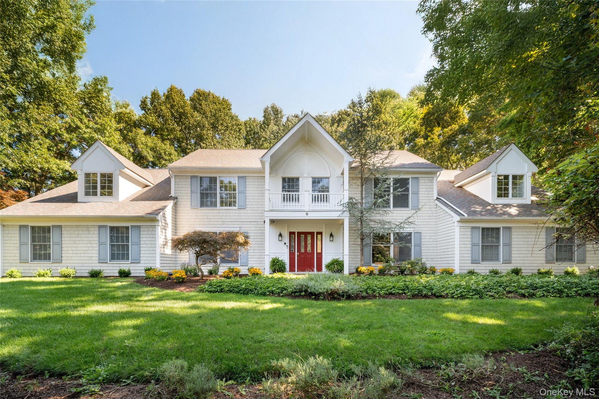 Set on a 1-acre desirable culdesac block offering waterviews of the LI Sound