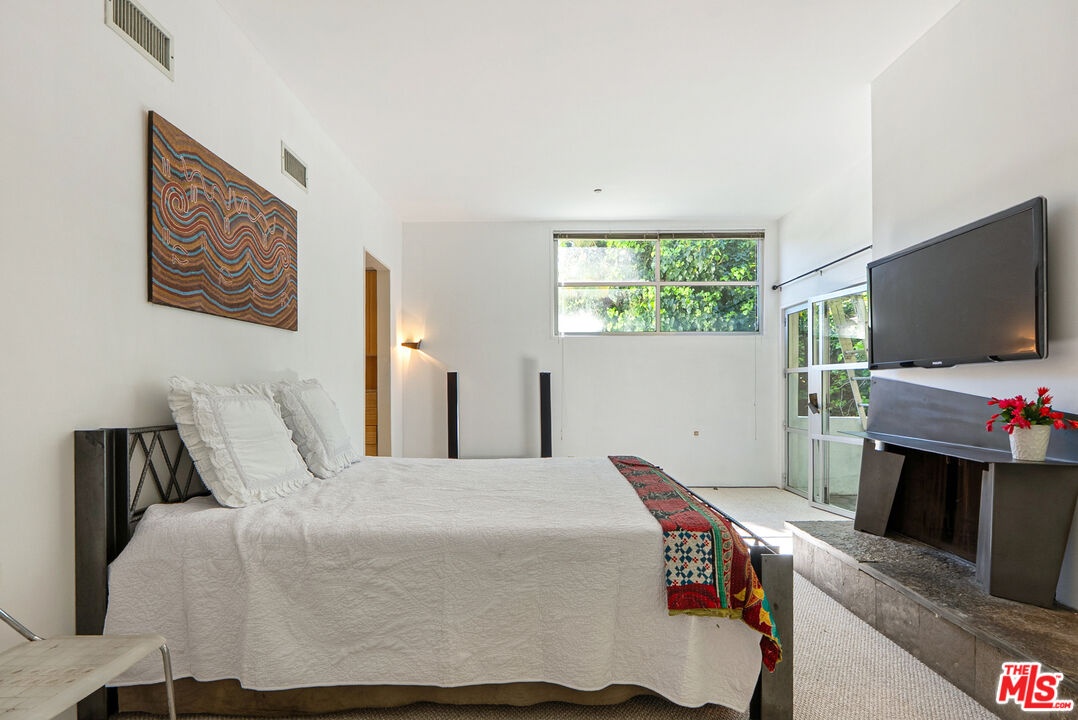 Primary bedroom with fireplace