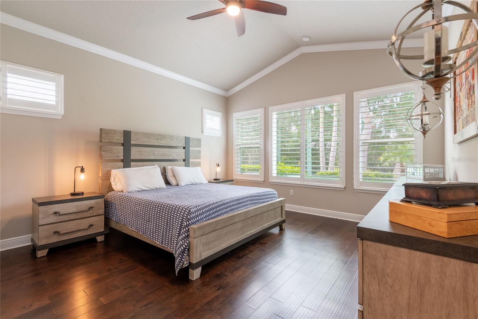 Spacious primary suite overlooking the backyard and conservation area.