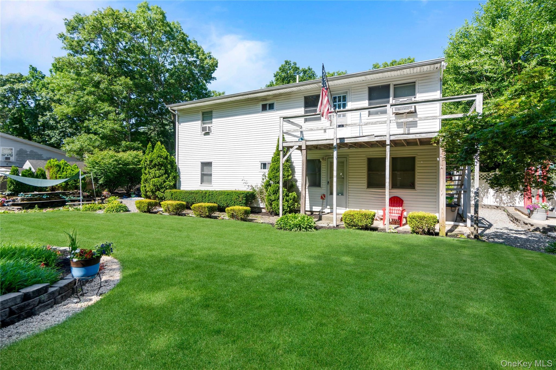Back of the house features an updated balcony.