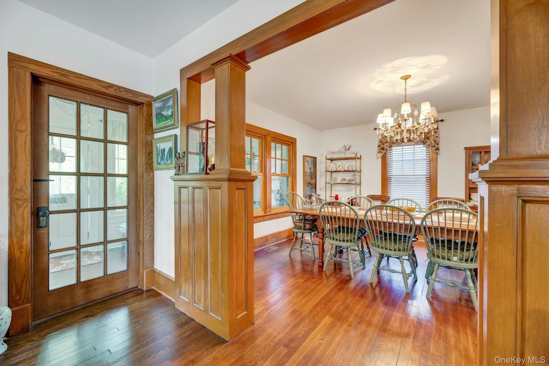 Living Room into Dining Room with Door to Enclosed Porch/Sunroom