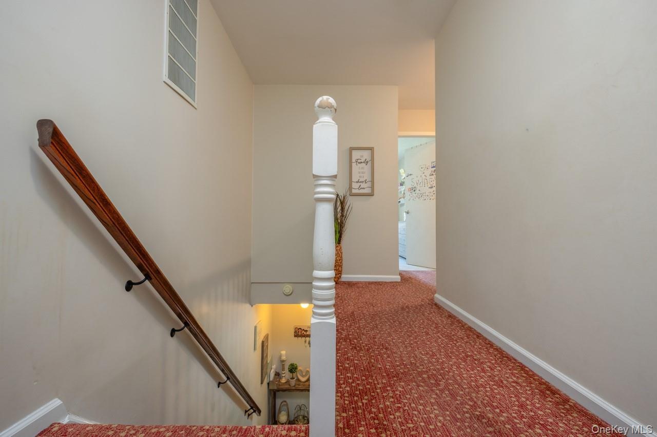 Two additional bedroom and main bathroom in the front.