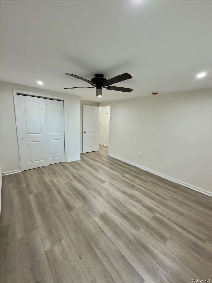 Spacious 1st bedroom with closet space.