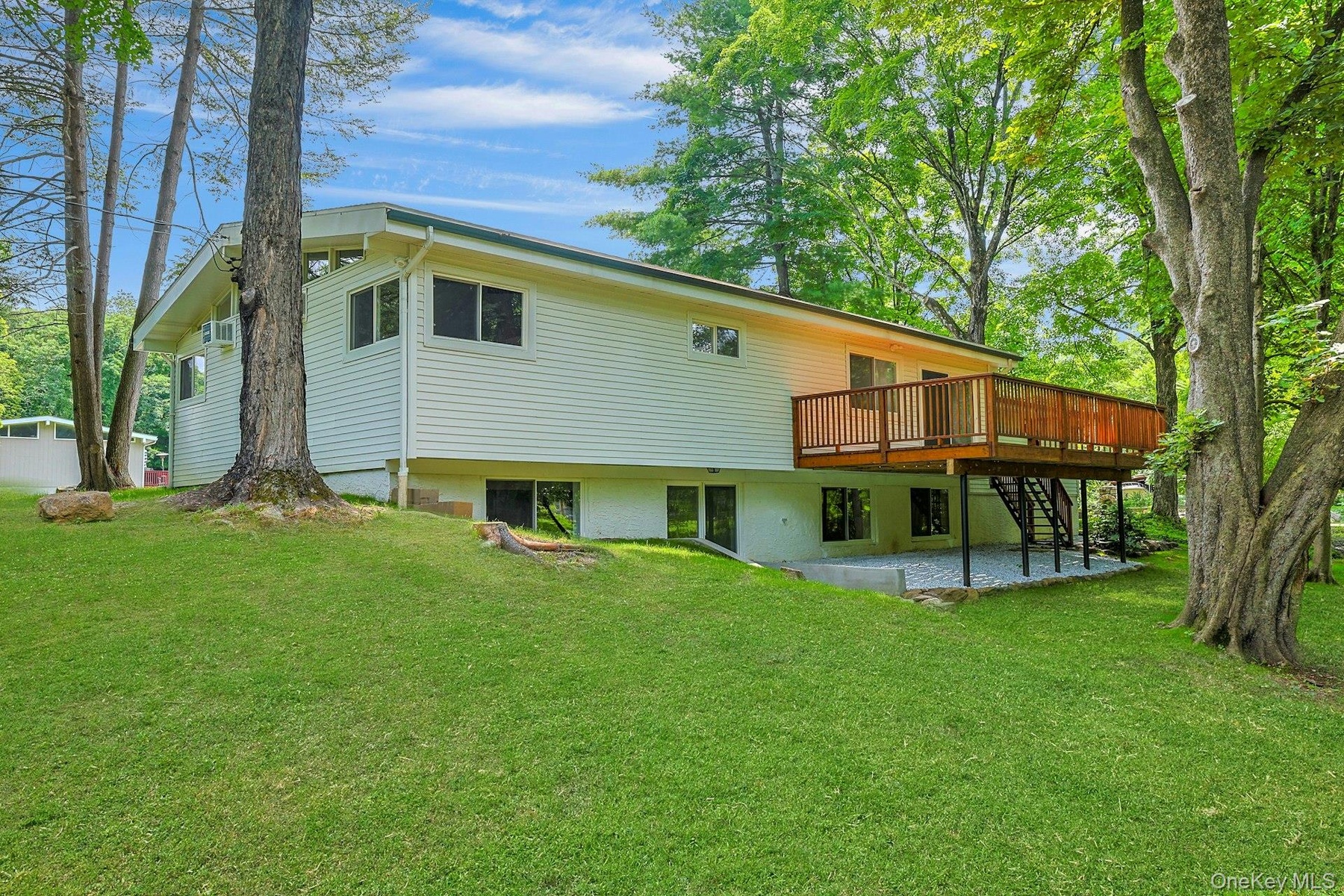 View of side yard and deck