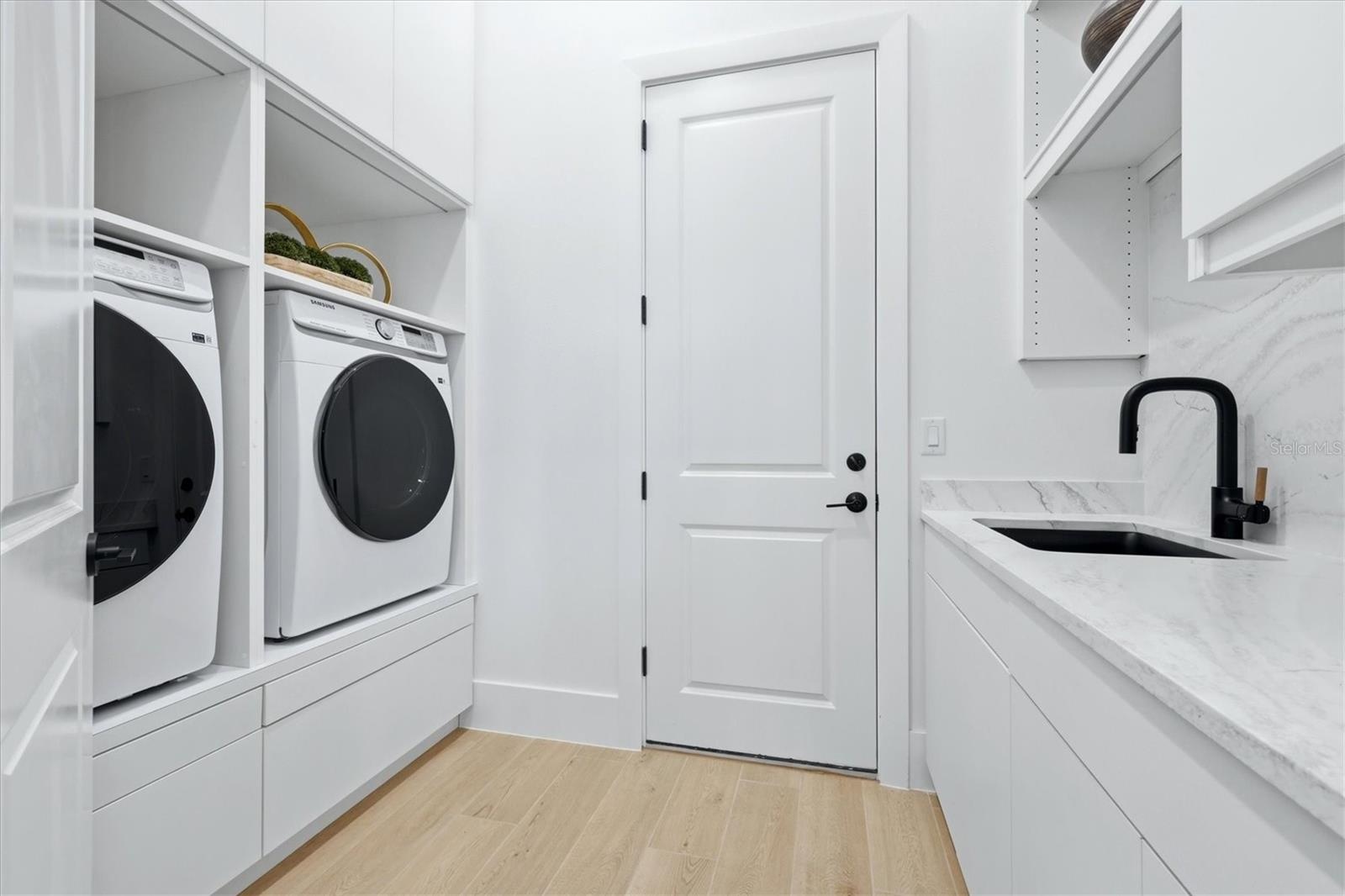 laundry rm with extra cabinets