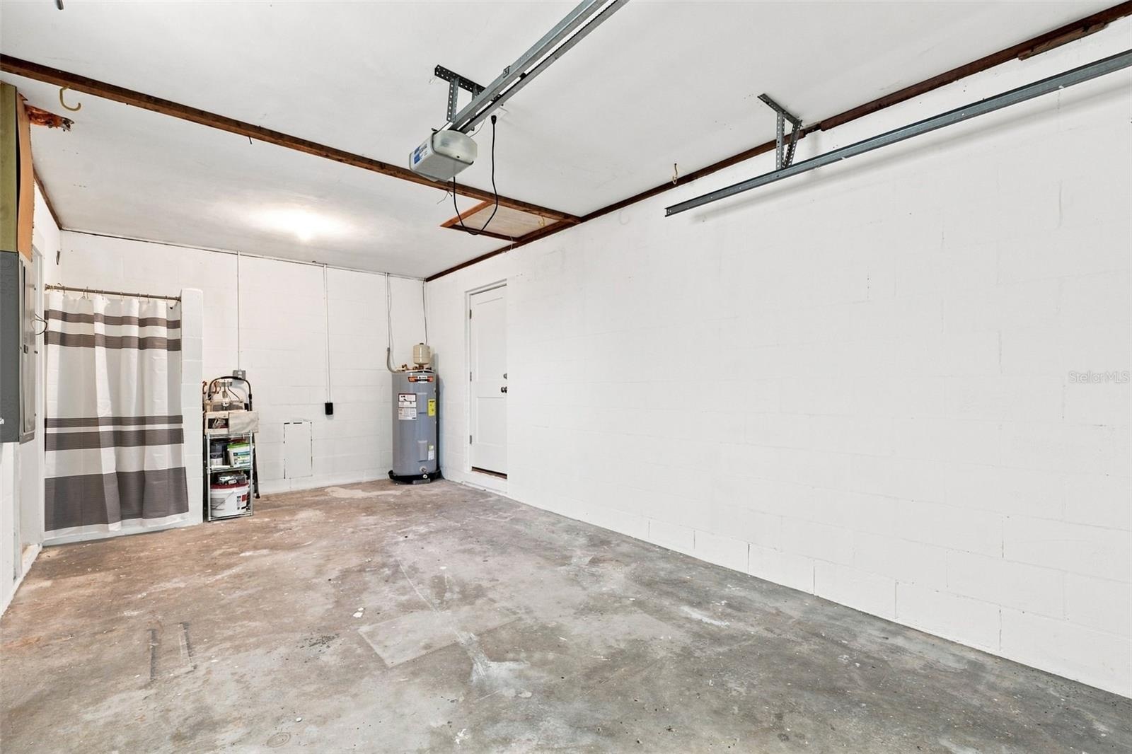 Houses the hot water heater, washer/dryer hook ups, and a shower for rinsing.