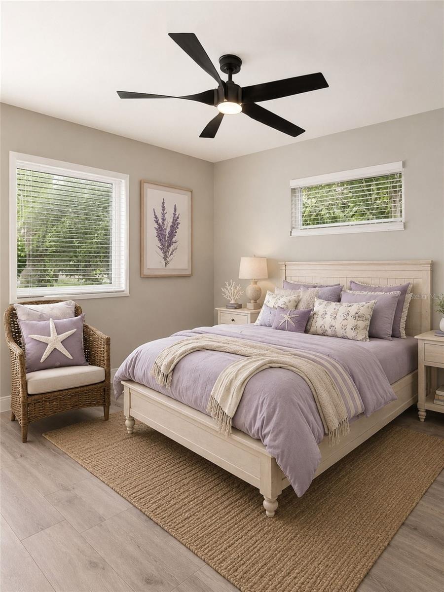 Three bedrooms are grouped on one side of the home, creating a comfortable separation from the main living areas.