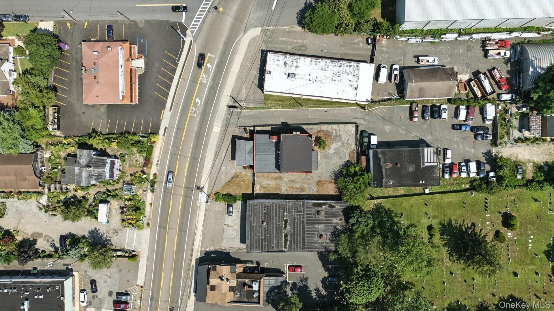 View of property location with industrial structures