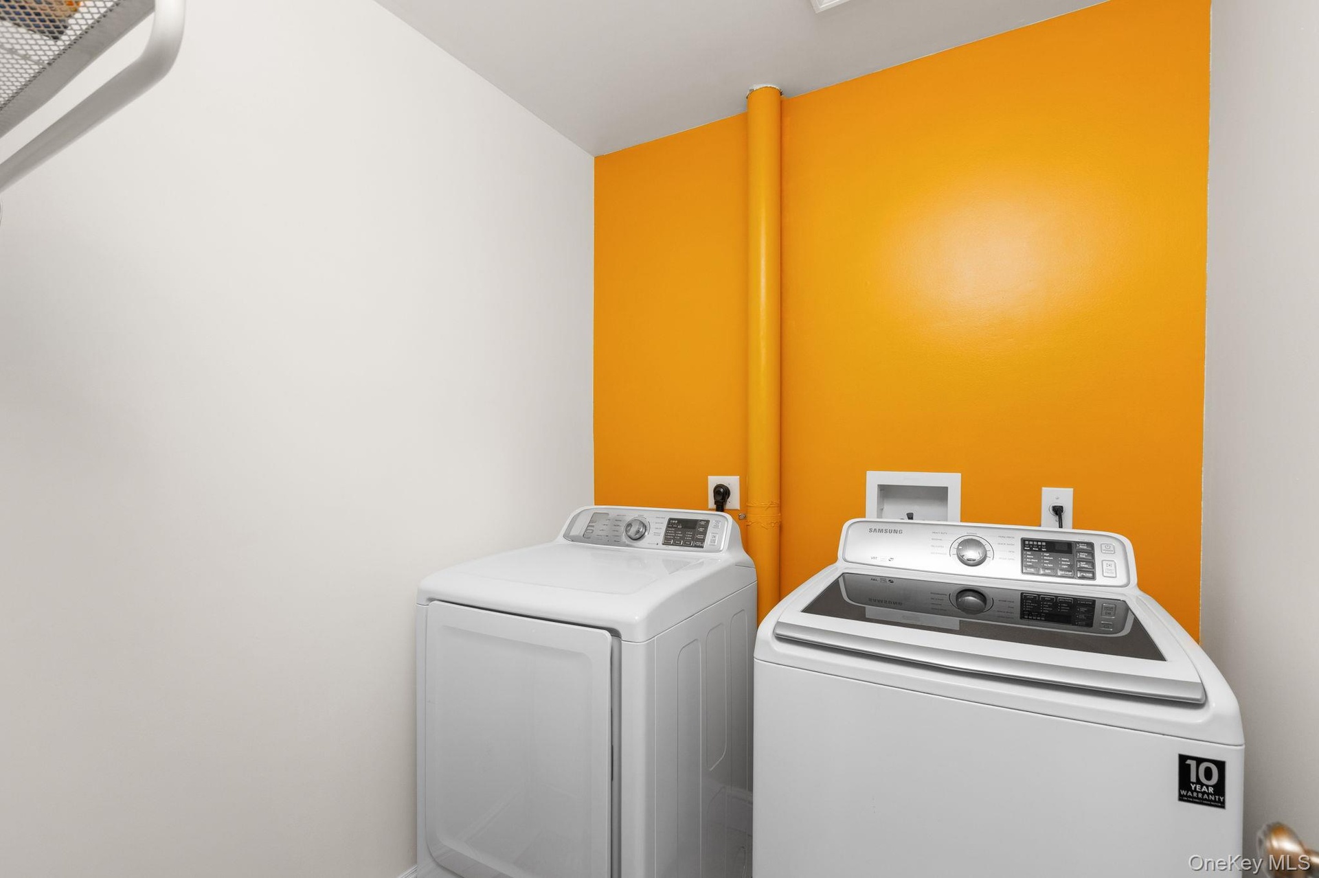 Conveniently located on the upper level, the laundry room adds ease and practicality to everyday living, just steps from the bedrooms.