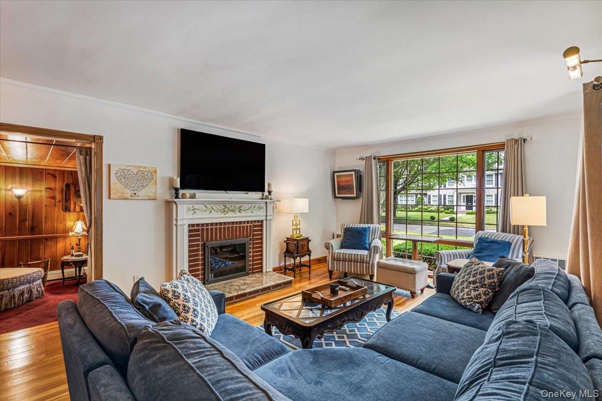Living Room w/ Wood Burning Fireplace