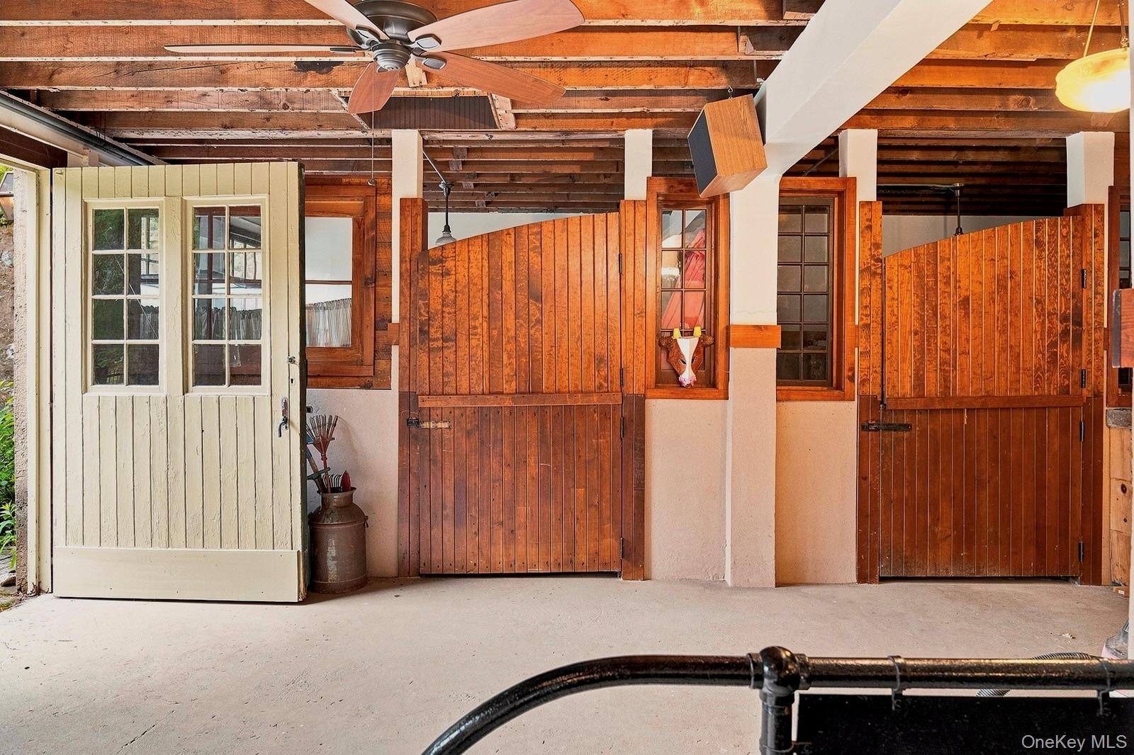 First floor of barn with original stall doors and access to pool
