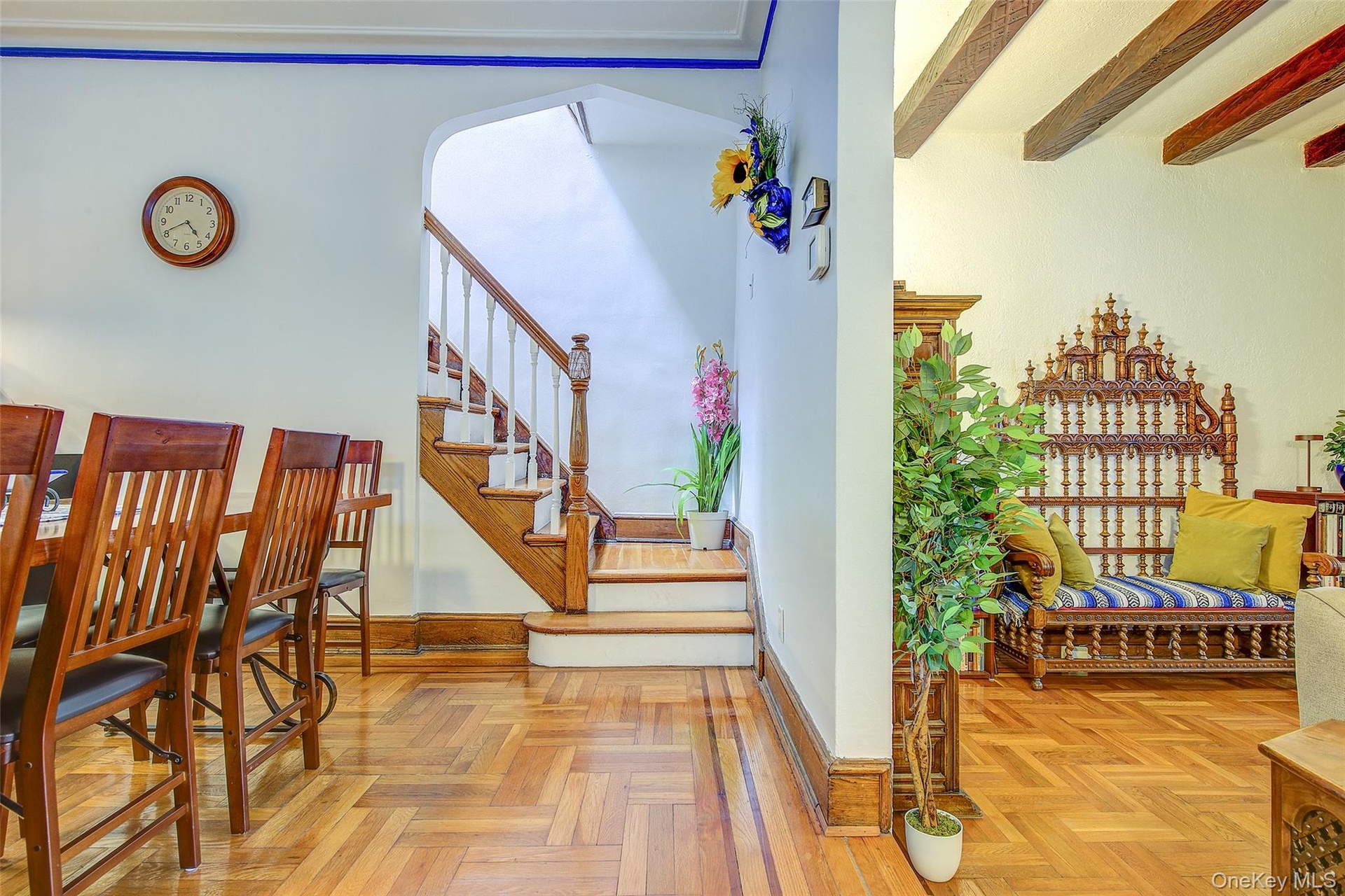 Stairs to second floor, bedrooms and primary bathroom.  Top floor also has a skylight and access to roof.