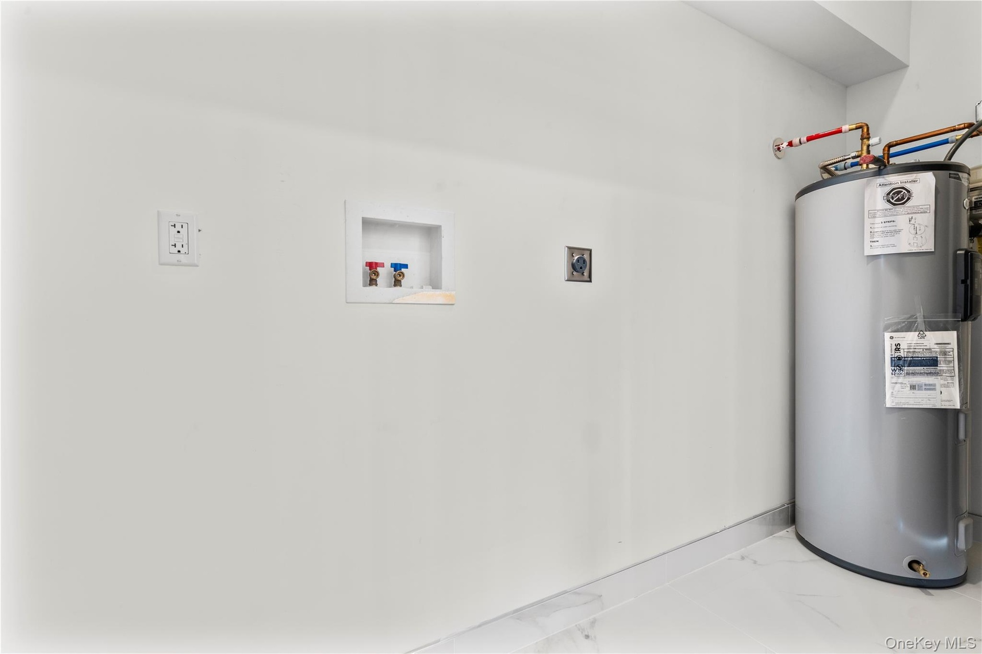 Main level laundry hookups for each unit