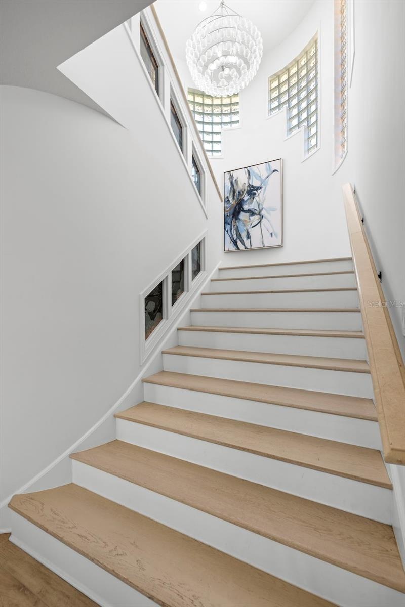Staircase to Primary Upper Level